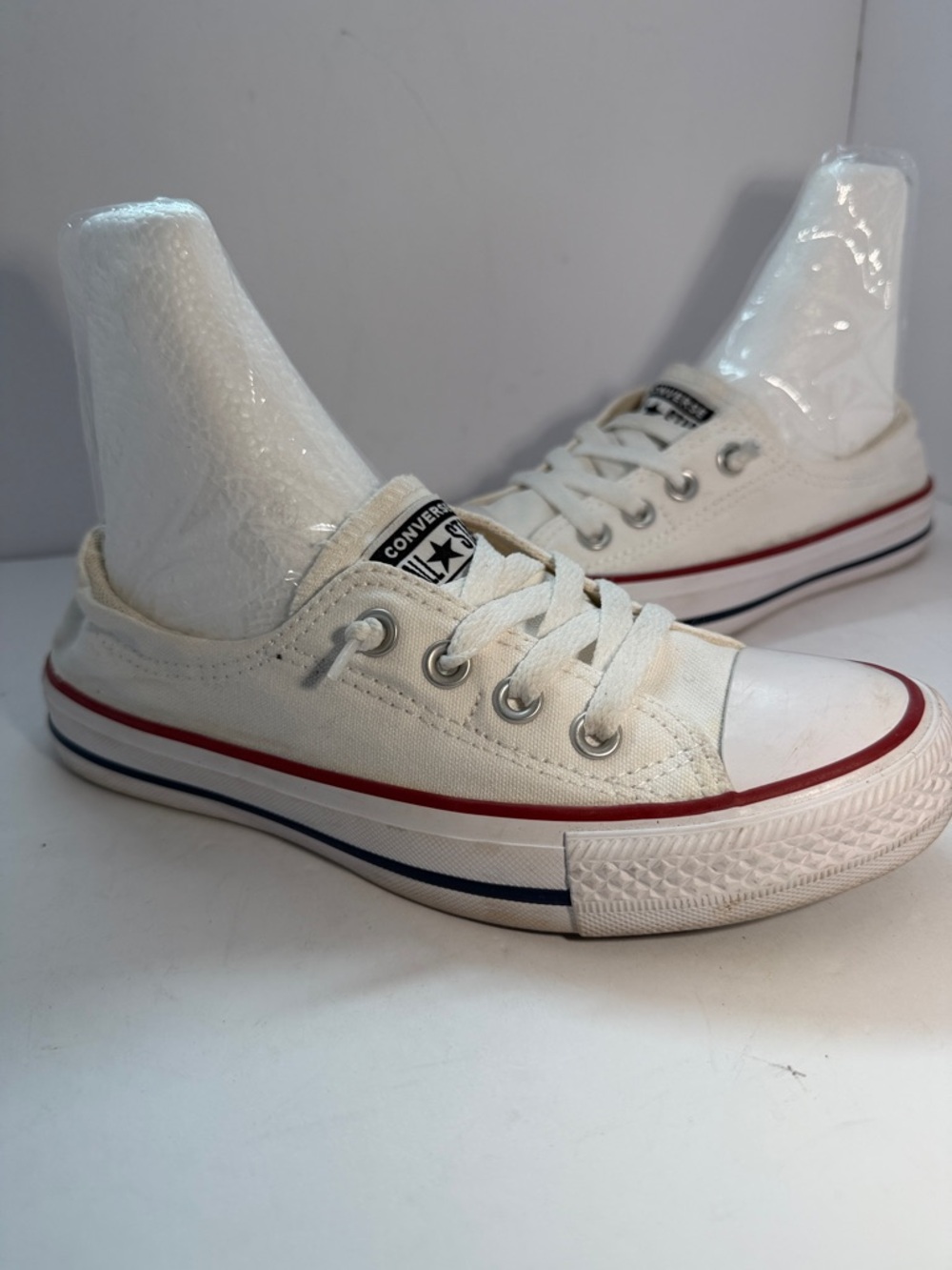 Converse White Low-Top Sneakers with Red and Blue Stripe